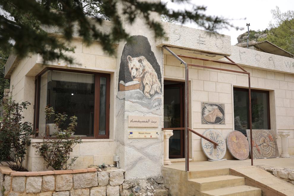 Exterior of the Eco Art Mosaic house decorated with mosaic works