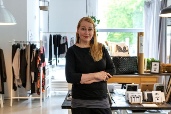 Portrait picture of Riika Flink in her shop